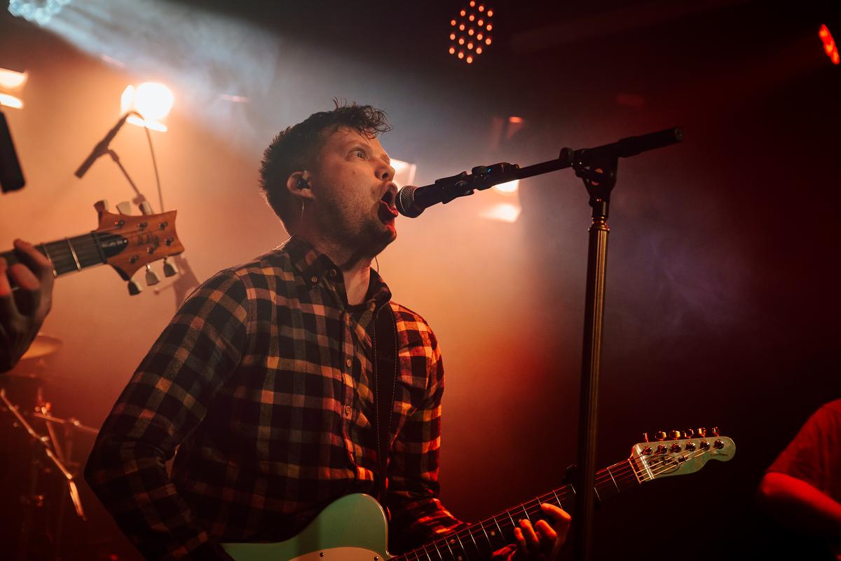 Singer in orange light